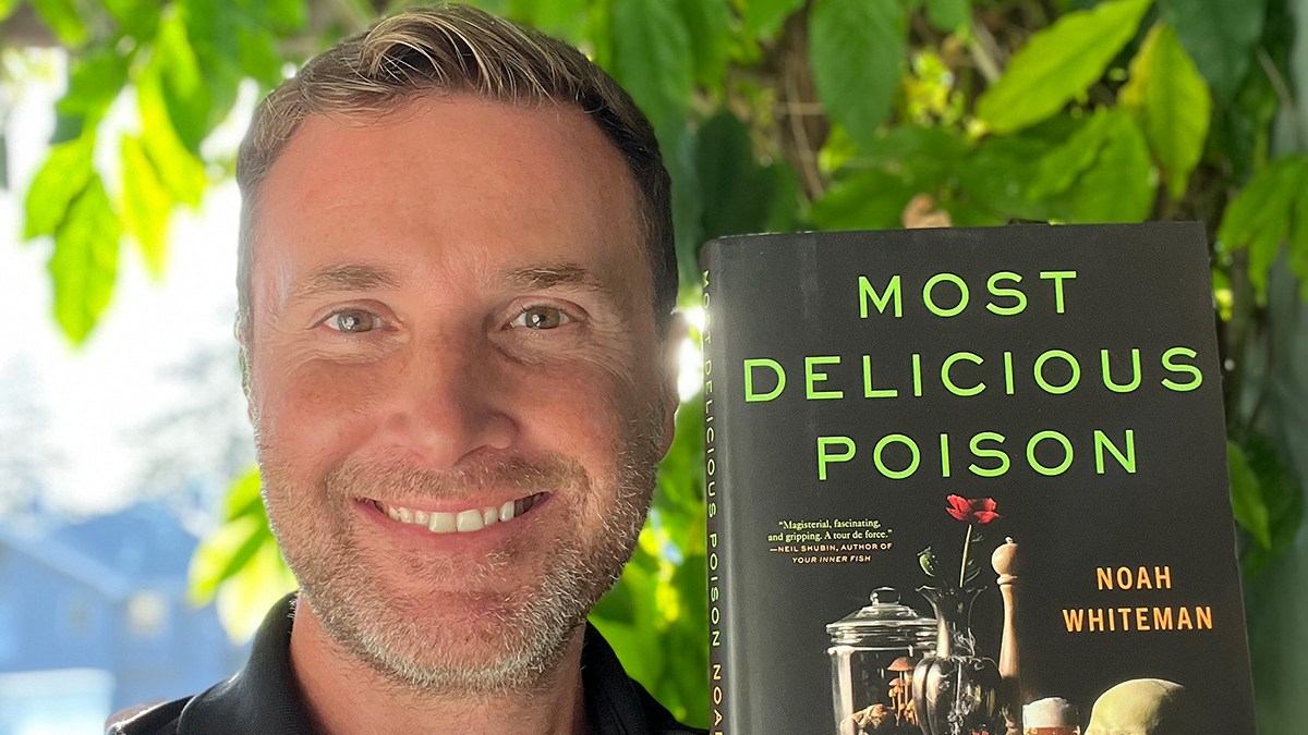 Noah Whiteman with book